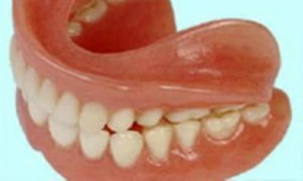 چگونه با دندان مصنوعی کنار بیاییم؟